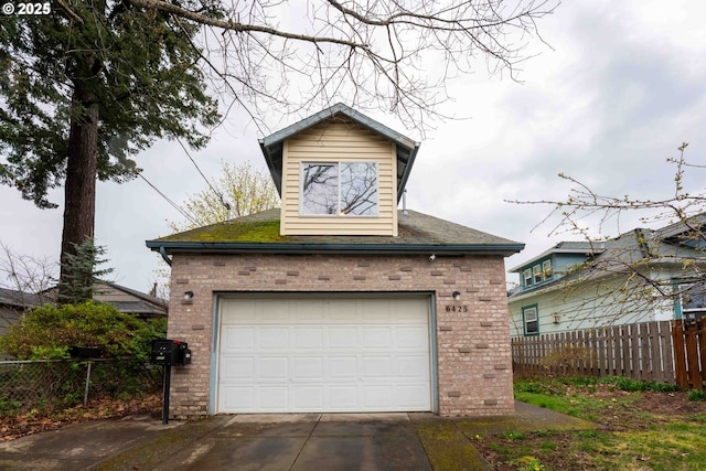 6425 SE Woodstock Blvd, Portland, OR 97206 - garage featuring fence and concrete driveway