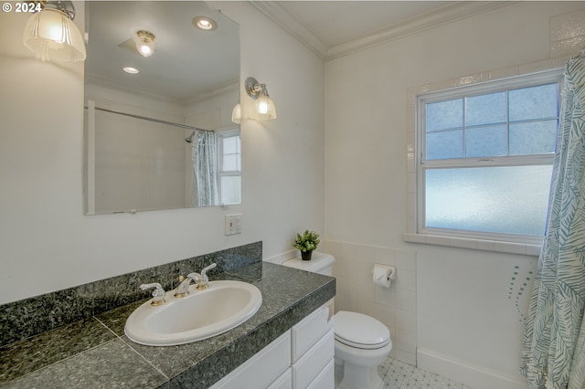 bathroom with a shower with shower curtain, tile patterned floors, crown molding, vanity, and toilet