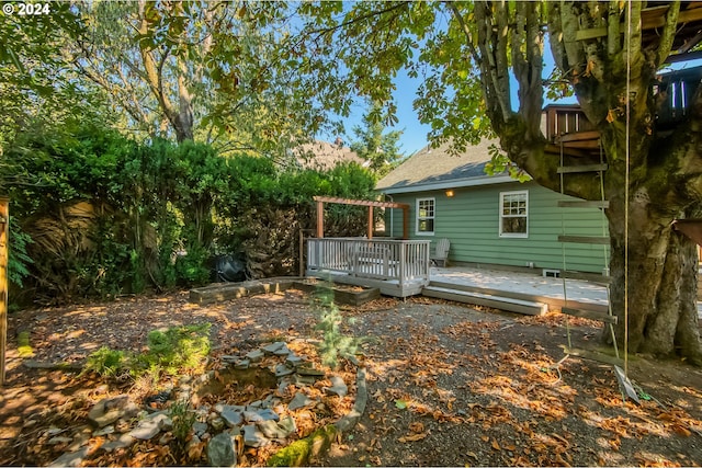 view of yard with a deck