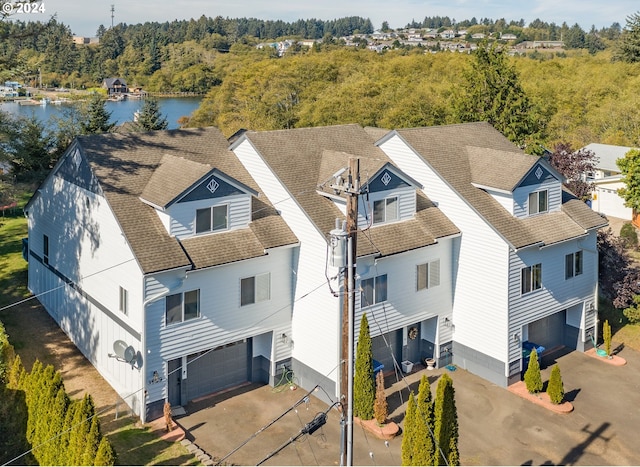 bird's eye view with a water view