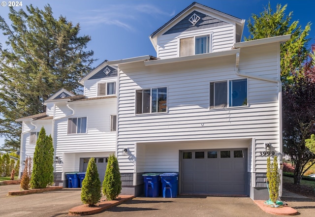 view of front of property with a garage