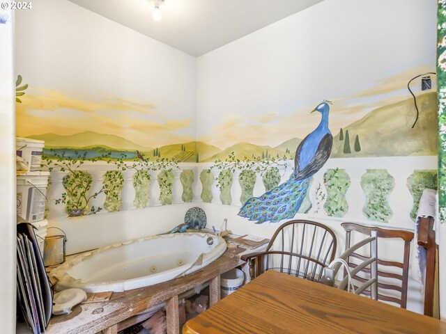 bathroom featuring a tub to relax in