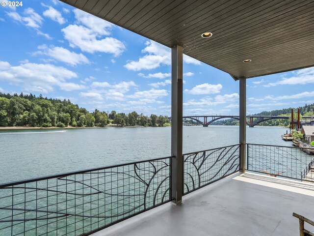 balcony featuring a water view