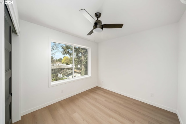 6061 NE Simpson St, Portland, OR 97218 - unfurnished bedroom featuring light wood-style flooring and ceiling fan