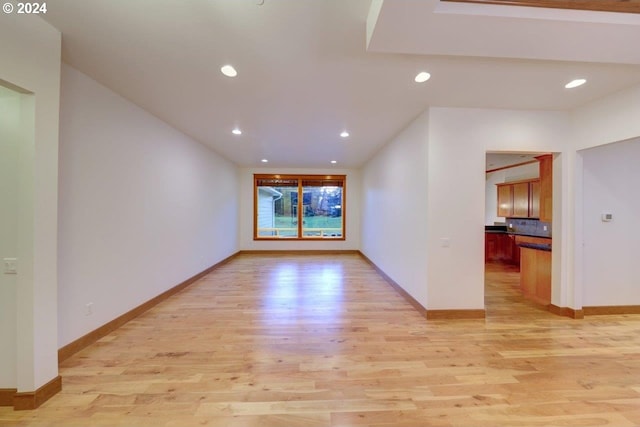 unfurnished living room with light wood-type flooring