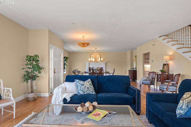 35222 NE 92nd Ct, La Center, WA 98629 - living area featuring an inviting chandelier, baseboards, stairs, and wood finished floors