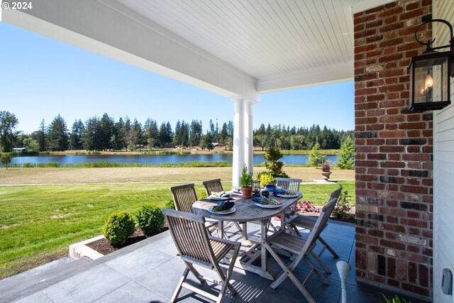 view of patio / terrace with a water view