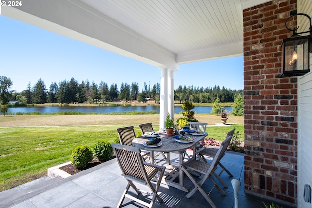 35222 NE 92nd Ct, La Center, WA 98629 - view of patio / terrace with outdoor dining area and a water view