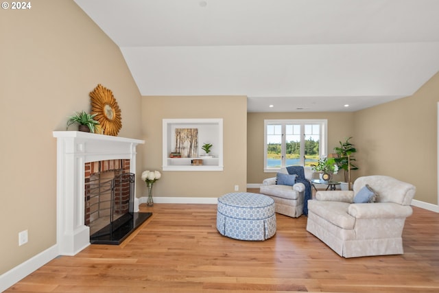 35222 NE 92nd Ct, La Center, WA 98629 - living area featuring lofted ceiling, recessed lighting, baseboards, a fireplace, and wood finished floors
