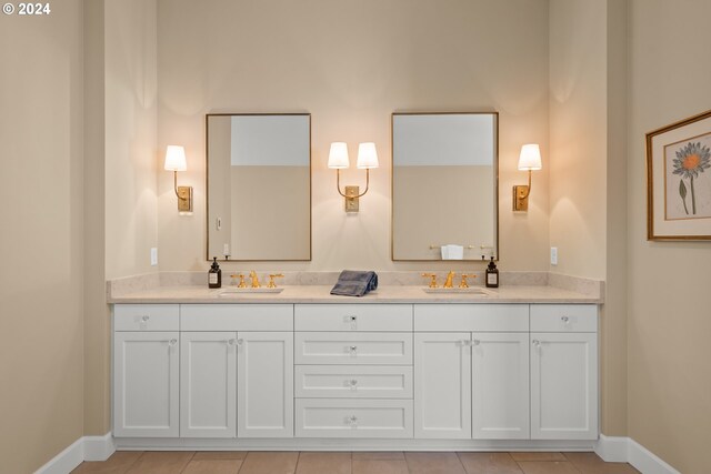 bathroom featuring vaulted ceiling, walk in shower, and vanity