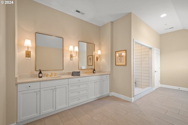 bathroom with vanity and tile patterned flooring