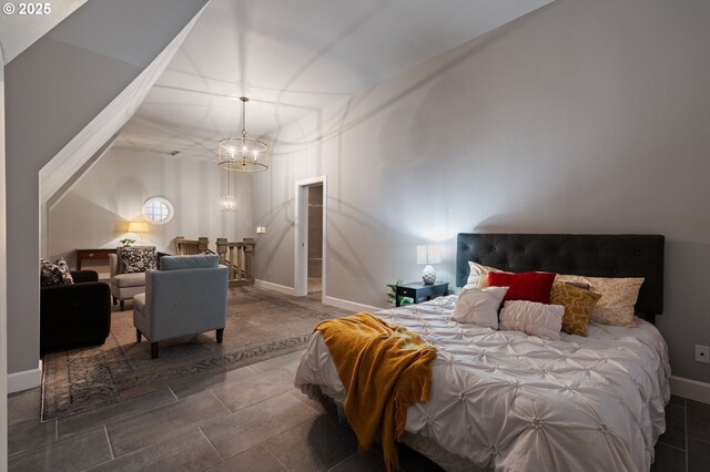 bedroom featuring a chandelier