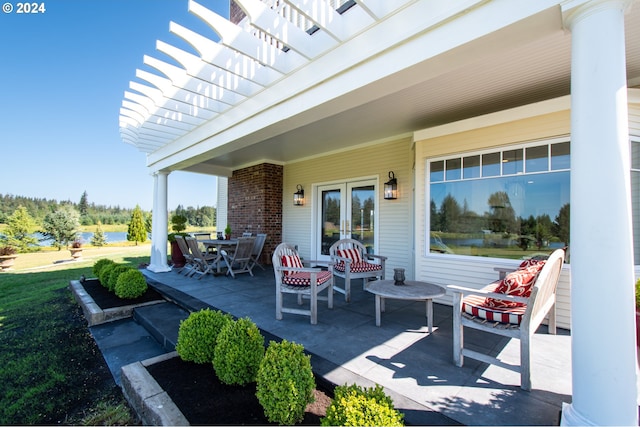 35222 NE 92nd Ct, La Center, WA 98629 - view of patio featuring french doors, a water view, and a pergola