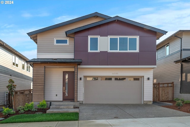 view of front of property with a garage