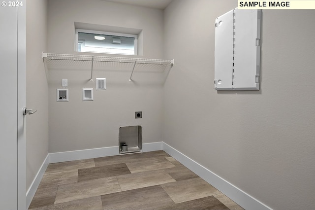 laundry room with hookup for an electric dryer and washer hookup