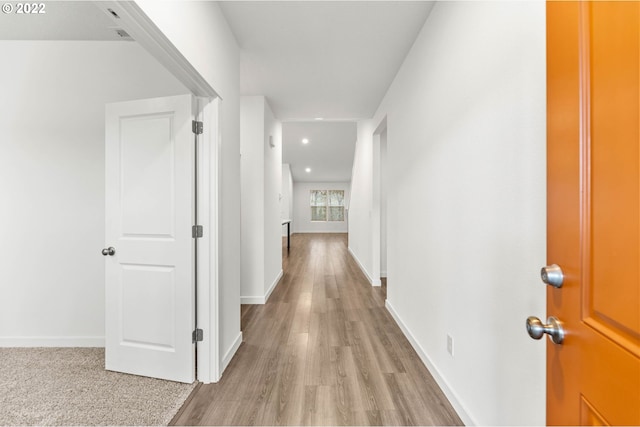 corridor featuring light wood-type flooring