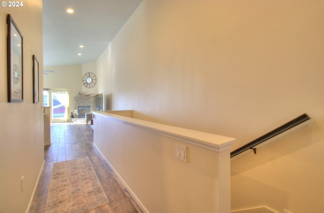 hallway with dark hardwood / wood-style floors