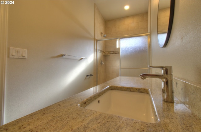 28999 Vizcaino Ct, Gold Beach, OR 97444 - bathroom featuring a sink and a tile shower