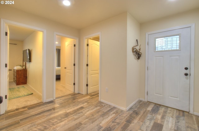 foyer entrance featuring hardwood / wood-style floors