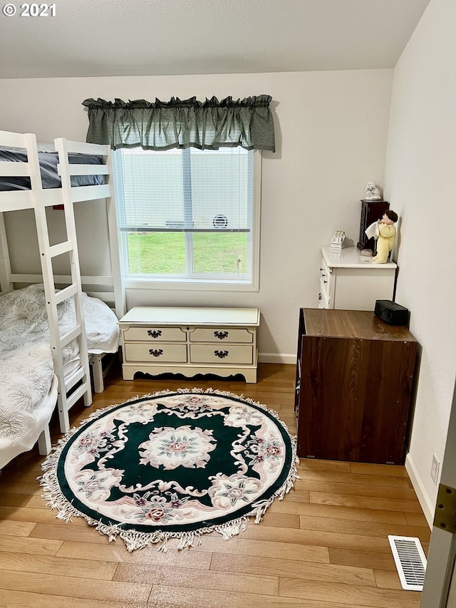 bedroom featuring light wood-type flooring