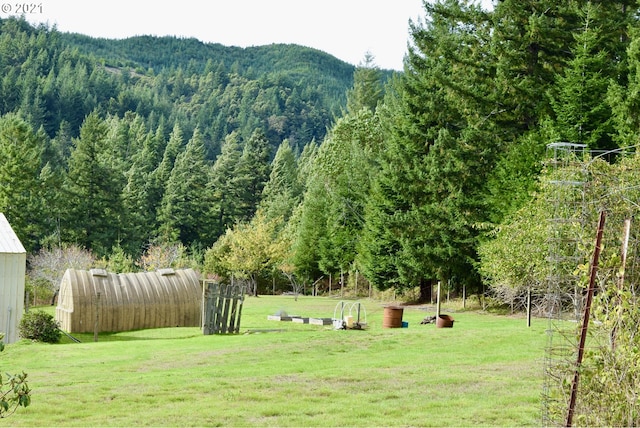 95851 Mckinnon Dr, Gold Beach, OR 97444 - exterior space featuring a mountain view and a wooded view