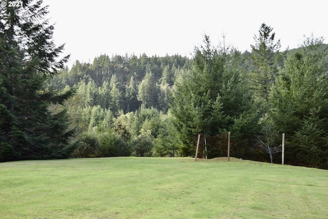 95851 Mckinnon Dr, Gold Beach, OR 97444 - view of yard with a wooded view