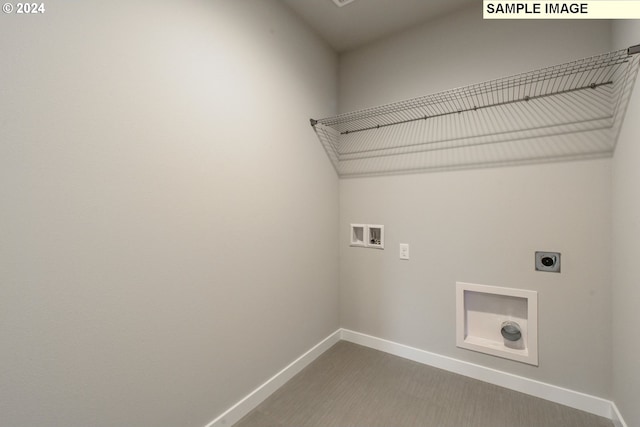 clothes washing area with electric dryer hookup, washer hookup, and carpet flooring