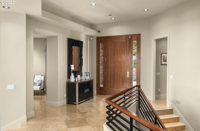 entryway with light tile flooring