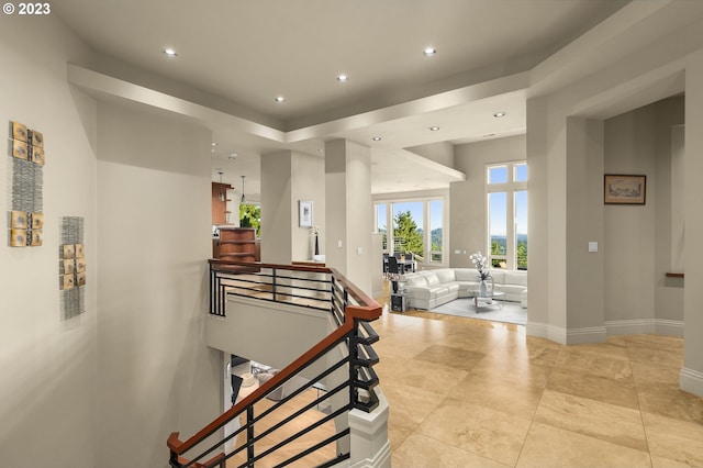 stairs featuring light tile floors