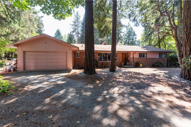 ranch-style home with a garage