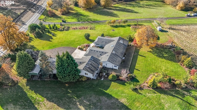 birds eye view of property featuring a rural view