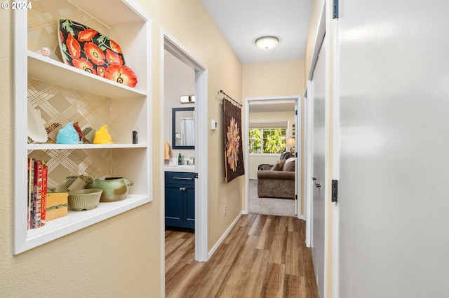 corridor featuring light hardwood / wood-style flooring