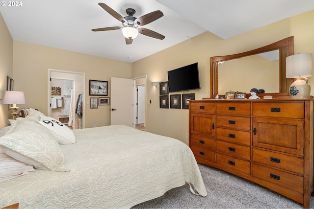 carpeted bedroom with connected bathroom and ceiling fan