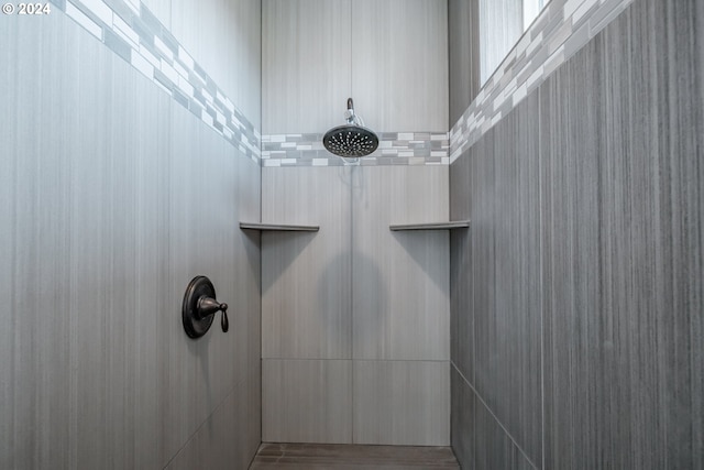 interior details featuring walk in shower