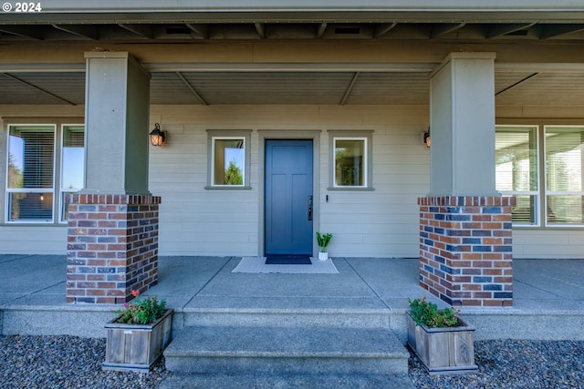 property entrance with a porch