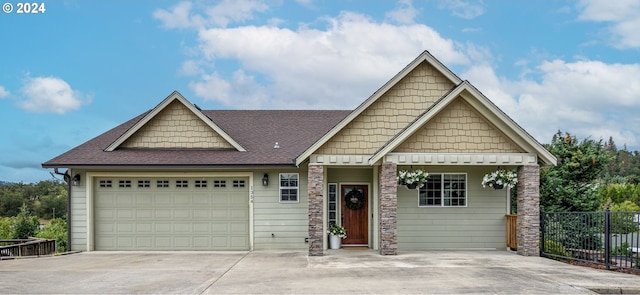 craftsman-style house featuring a garage