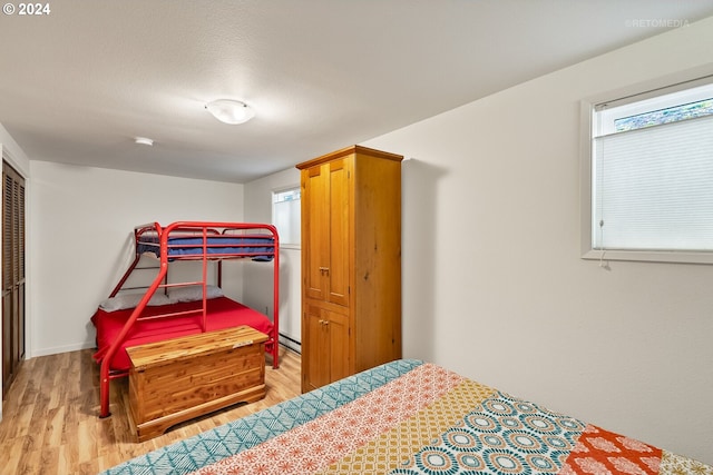 bedroom featuring light hardwood / wood-style flooring