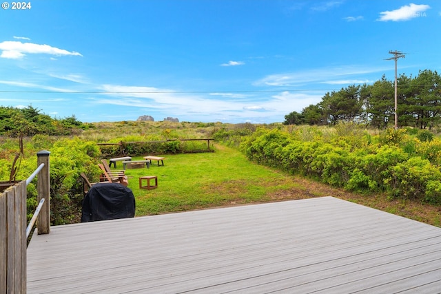 deck featuring a yard