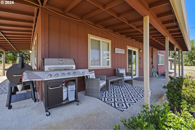 view of patio / terrace featuring an outdoor hangout area, french doors, and area for grilling