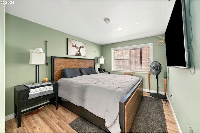 bedroom featuring light wood-type flooring