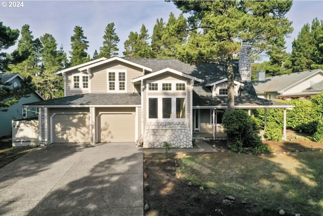 view of front of property with a garage