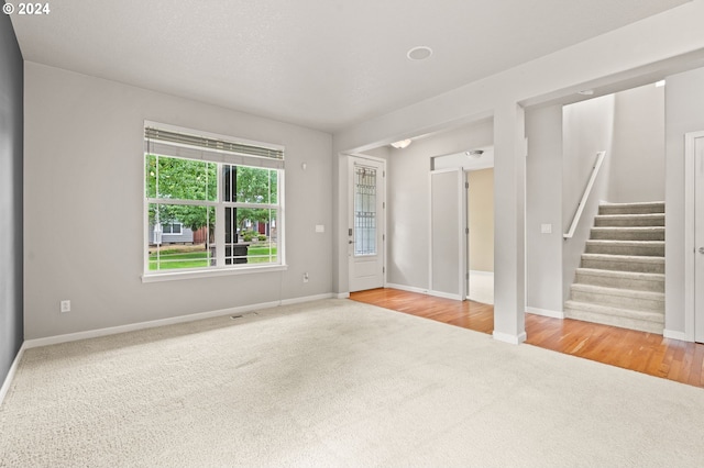 empty room with light wood-type flooring