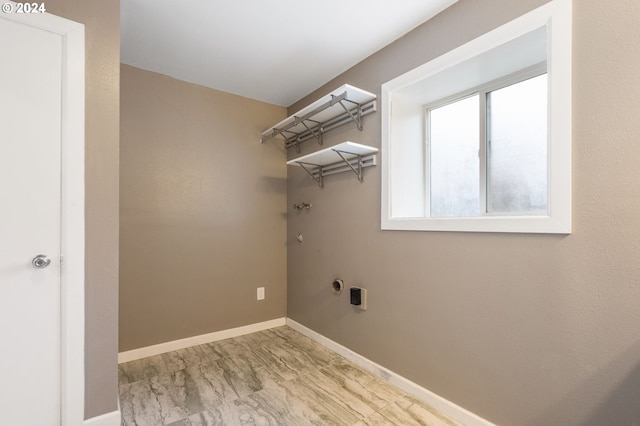 laundry room featuring hookup for an electric dryer