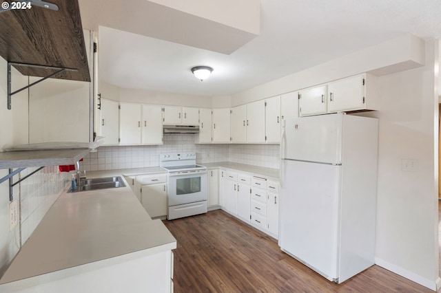 kitchen with white cabinetry, white appliances, sink, and tasteful backsplash