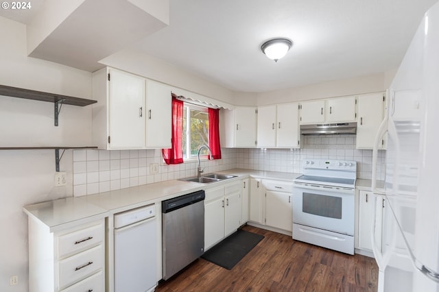 kitchen featuring sink, backsplash, white cabinets, and white appliances