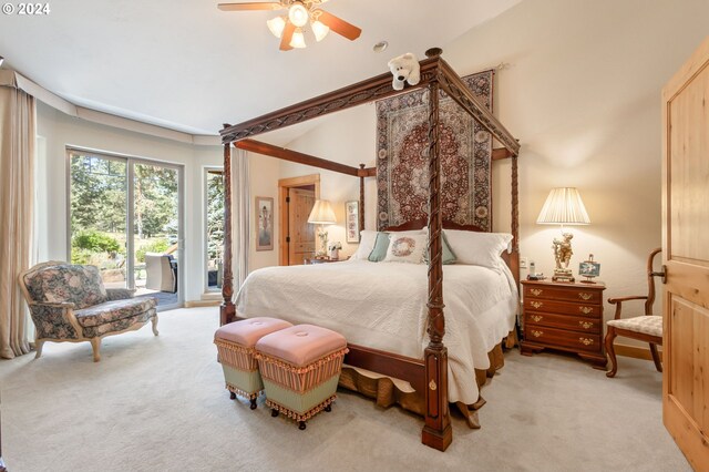 bedroom with ceiling fan, light carpet, and access to outside