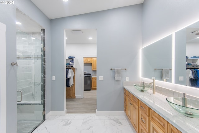 bathroom featuring vanity, walk in shower, and vaulted ceiling