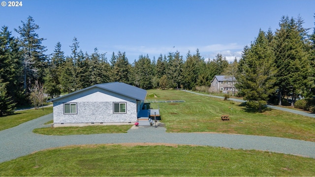 exterior space with a front lawn