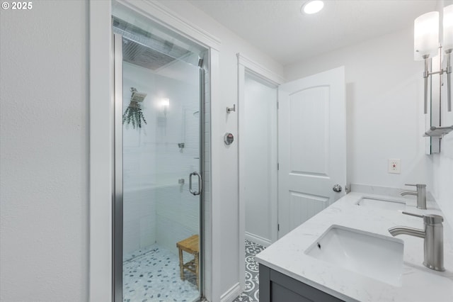 bathroom featuring vanity and walk in shower