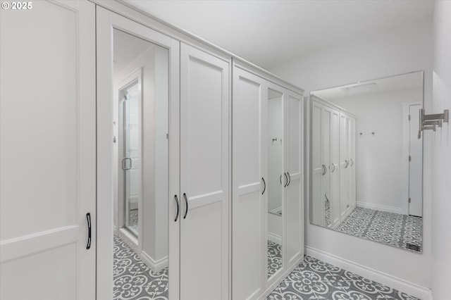 mudroom with tile patterned floors